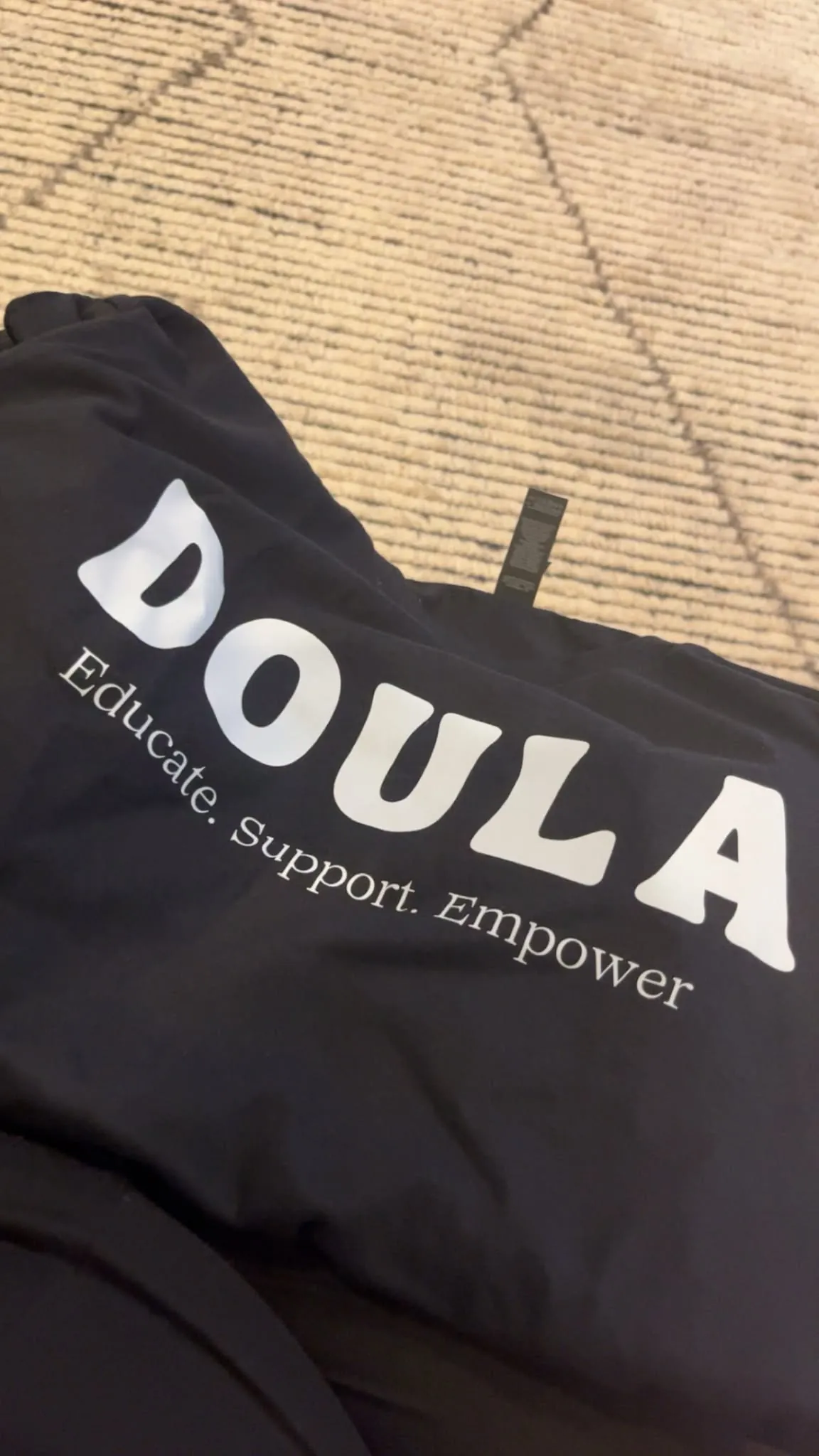 Doula shirt reading Educate, Support, Empower